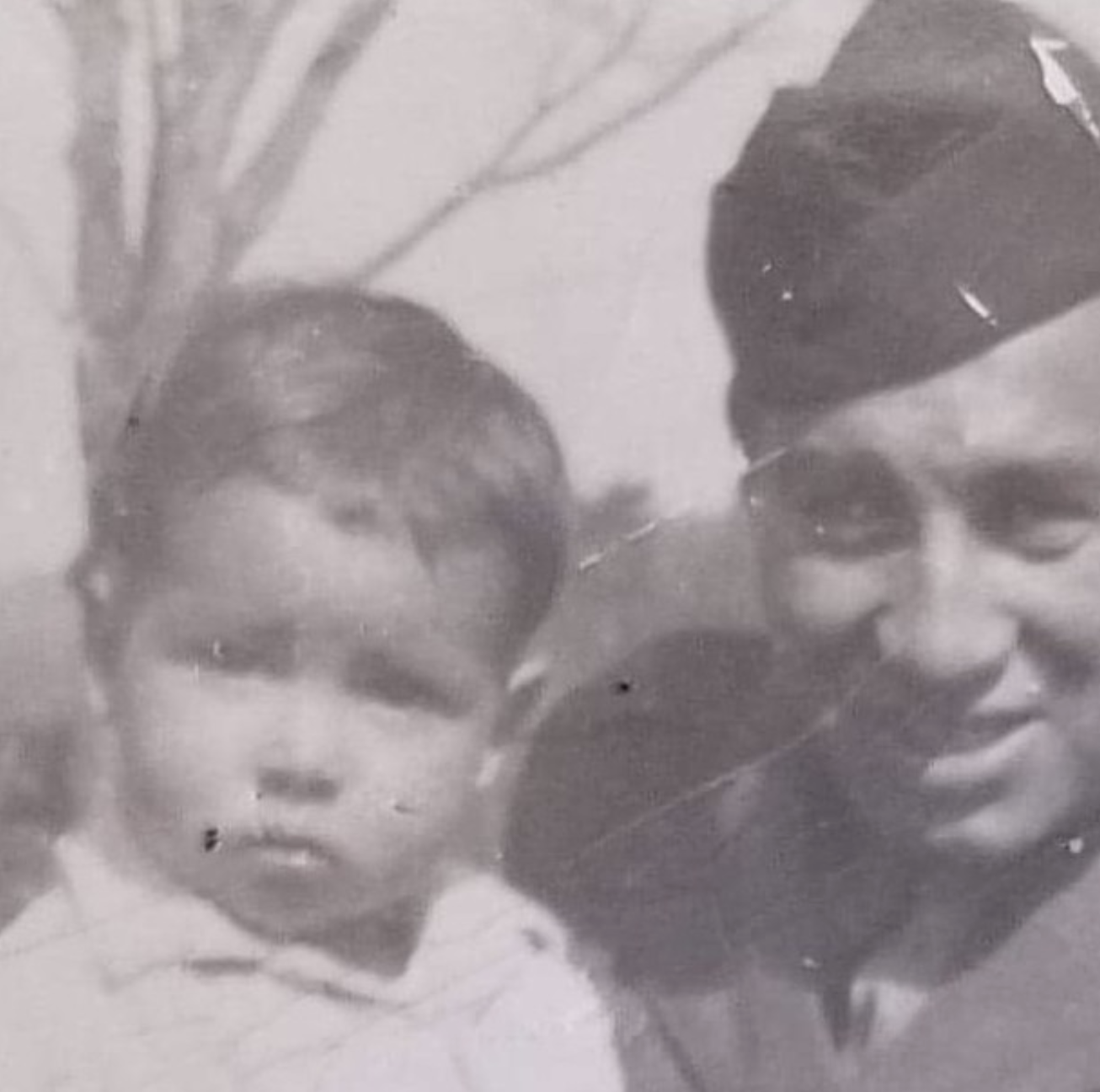 Bo Hampton returning home from World War II with his son Eber, age 3